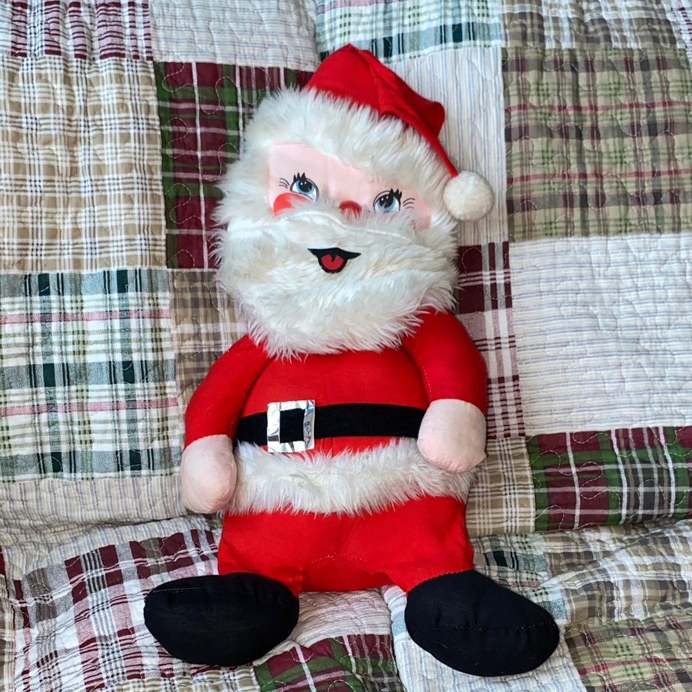 Vintage Santa about 19 inches long he has been well loved